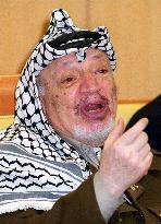 Arafat speaks before leaving Japan